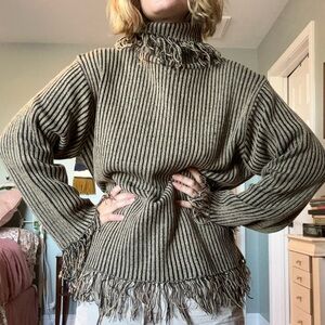 Unique Vintage tan and black sweater with fringe.